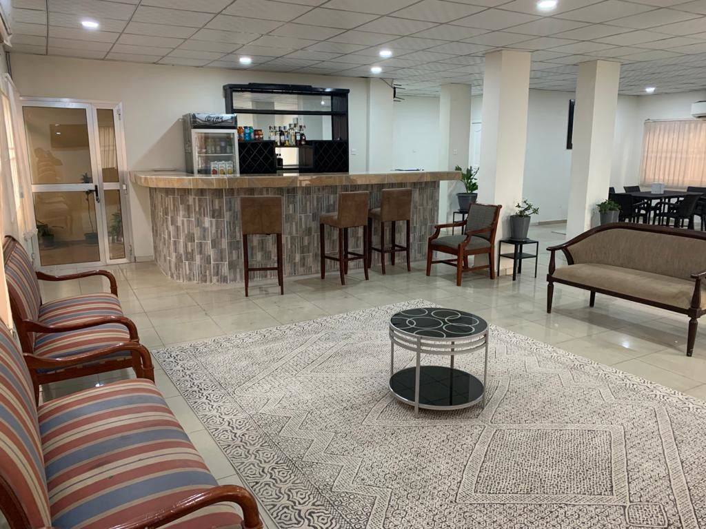 SierraLeone-SkyInn-launcharea-table-bar_SL